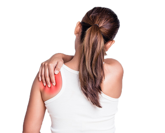 a girl in a whirt t-shirt with sholder ache, rabing her shoulder with her hand